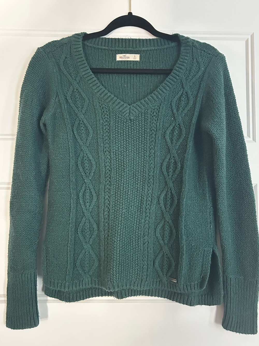 Dark green cable knit v-neck sweater